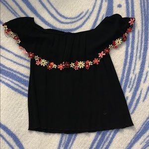 black off the shoulder top with flowers